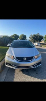 2015 Honda Civic SE in silver, showcasing clean exterior and nice rims, available for sale with 139,000 miles
