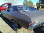1968 Chevrolet Chevelle project car with strong V-8 engine and racing transmission, showing minimal surface rust.