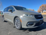 2021 Chrysler Pacifica Hybrid Limited in gray parked outdoors, showcasing its modern design and family-friendly features.