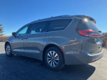 2021 Chrysler Pacifica Hybrid Limited FWD in gray, showcasing a family-friendly design with stylish details.