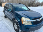 2007 Chevrolet Equinox LT parked in snow, showing clean exterior and good tires