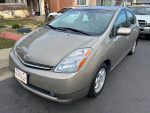 2007 Toyota Prius in good condition with leather seats, showcasing its plug-in hybrid features.