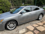 2009 Nissan Maxima in good condition with leather interior, sunroof, and navigation system