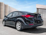 2013 Hyundai Elantra in black with low mileage for sale at reduced price, showing sleek rear design.