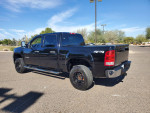 2013 GMC Sierra 4x4 Crew Cab truck with 162K miles, black exterior and recent paintwork in a parking lot.