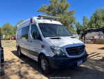 2017 Mercedes-Benz Sprinter 2500 Cargo Van in a rural setting, perfect for various commercial uses.