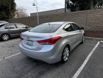 2013 Hyundai Elantra Limited FWD parked, featuring sleek design, good condition, and no accidents.