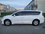 2017 Chrysler Pacifica Touring-L Plus in excellent condition, white color, side view, parked on street.