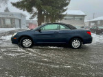 2008 Chrysler Sebring Convertible LX in excellent condition parked on snowy ground