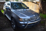 2006 BMW X5 4.4 V8 AWD SUV with low mileage in good condition, showcasing its stylish exterior and clean design.