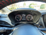 Interior dashboard of a 2024 Subaru Impreza RS with gauge cluster and touchscreen display