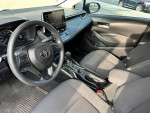 Interior view of a 2020 Toyota Corolla LE with modern dashboard and comfortable seats.