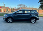 2017 Ford Escape S FWD in excellent condition with low mileage and new tires, parked outside with blue sky.