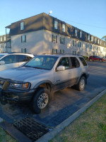 2001 Honda Passport EX RWD parked, needs jump to start, priced at $2500 or best offer, 91,000 miles.