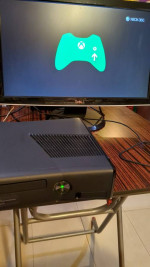 Microsoft Xbox 360 S 4GB Model 1439 (CONSOLE AND POWER WIRE ONLY)